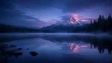Small compressed alpine landscape photograph before AI upscaling